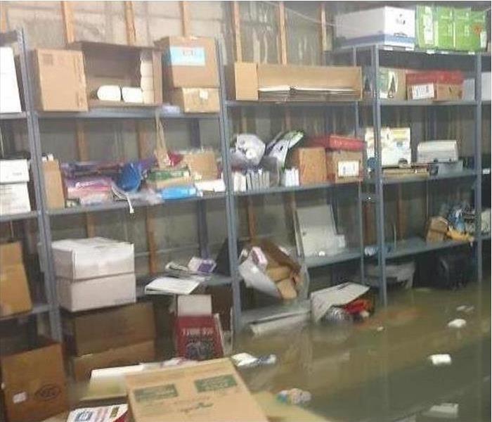 standing water in the storage shelving area, flotsam